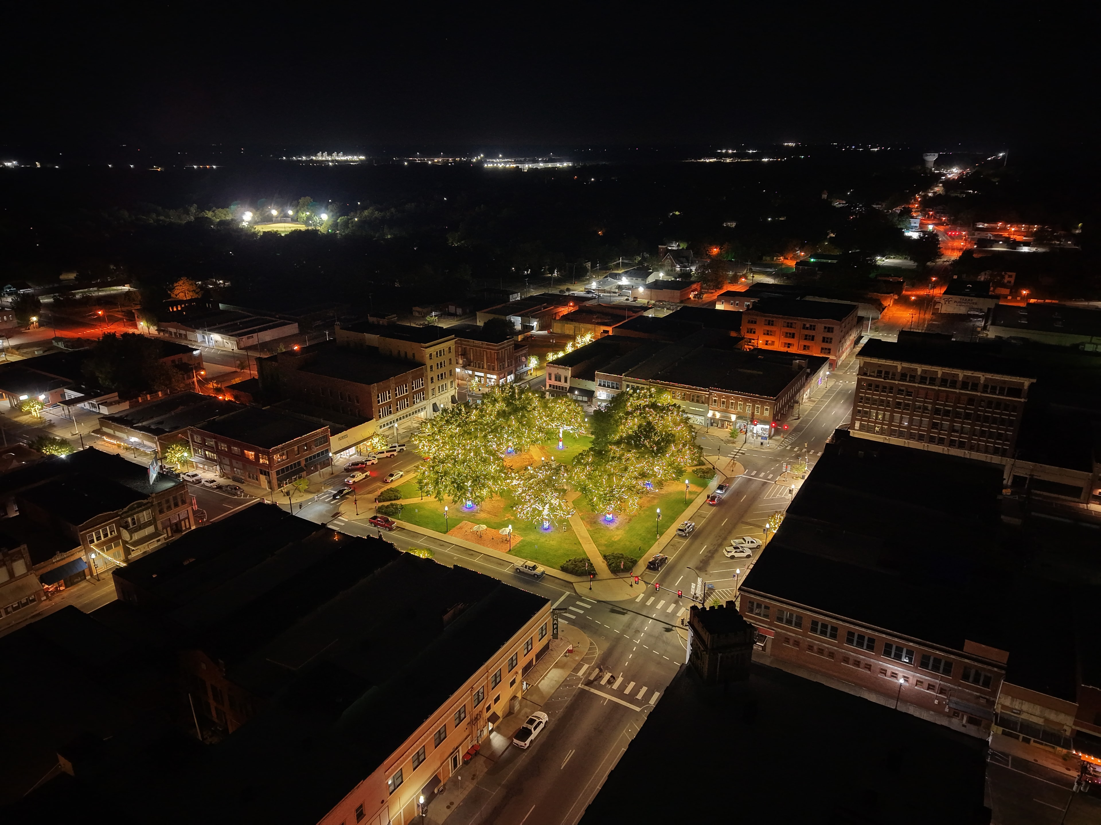 Paris TX downtown night aerial